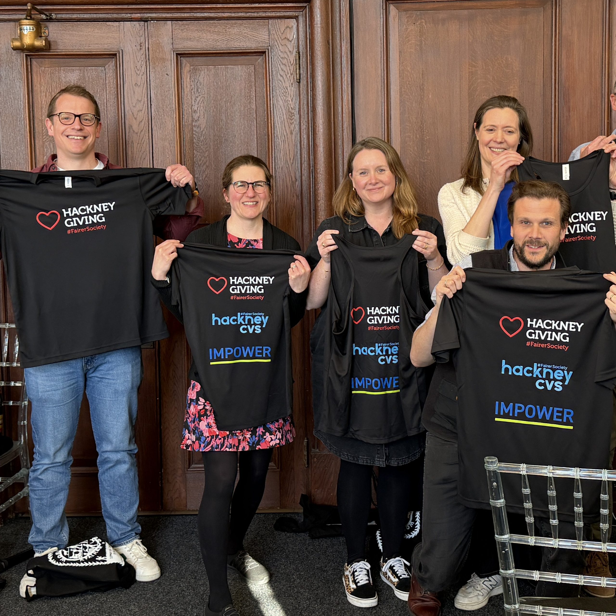Runners with their Hackney Giving shirts
